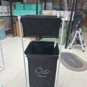 Fabric Laundry Hamper With Dual Compartments And White Metal Frame For Organized Clothing And Underwear Storage - Image 4